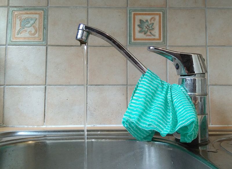 Water running from a kitchen tap